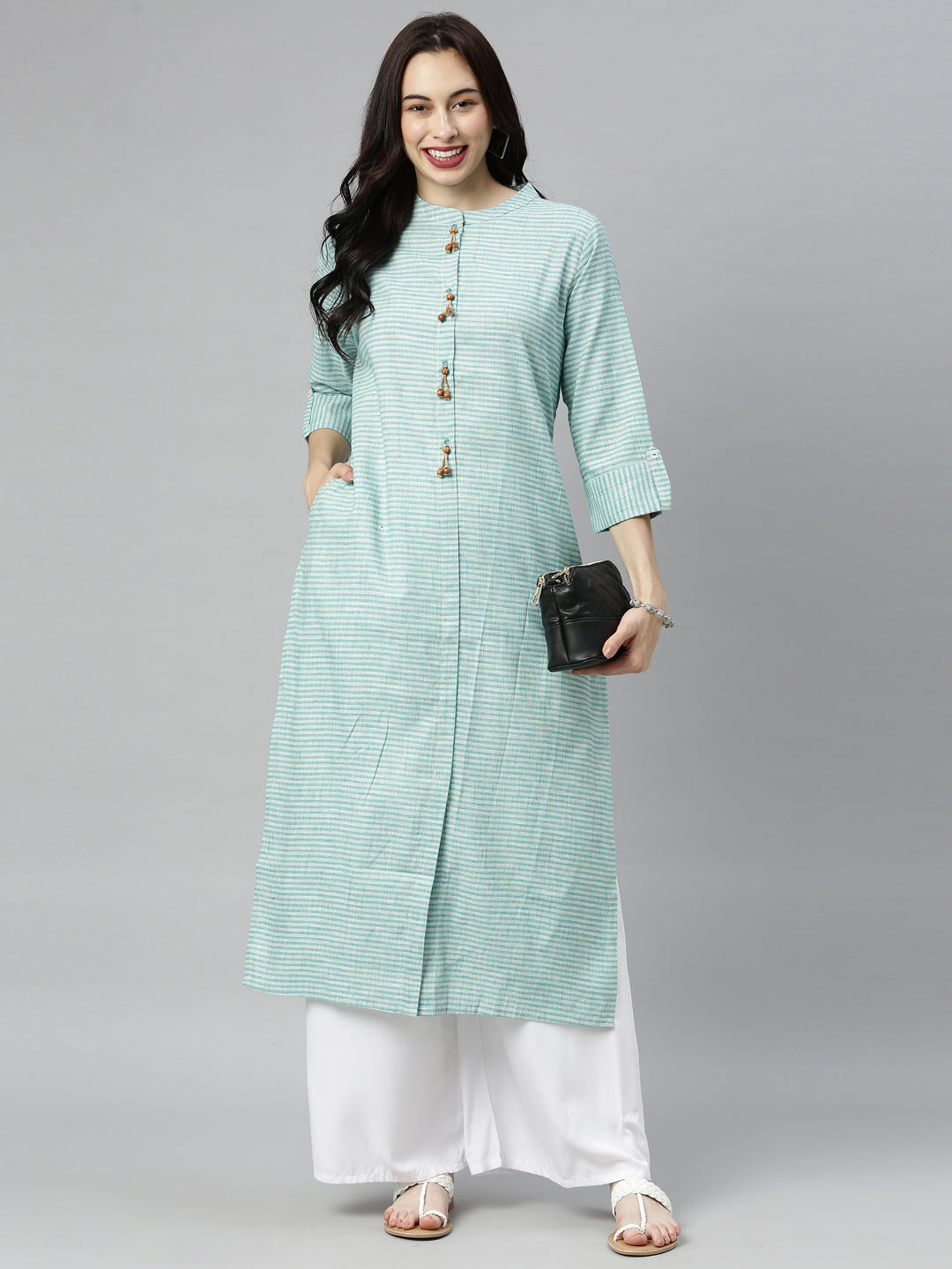 Neerus Green cotton solid kurti - front view