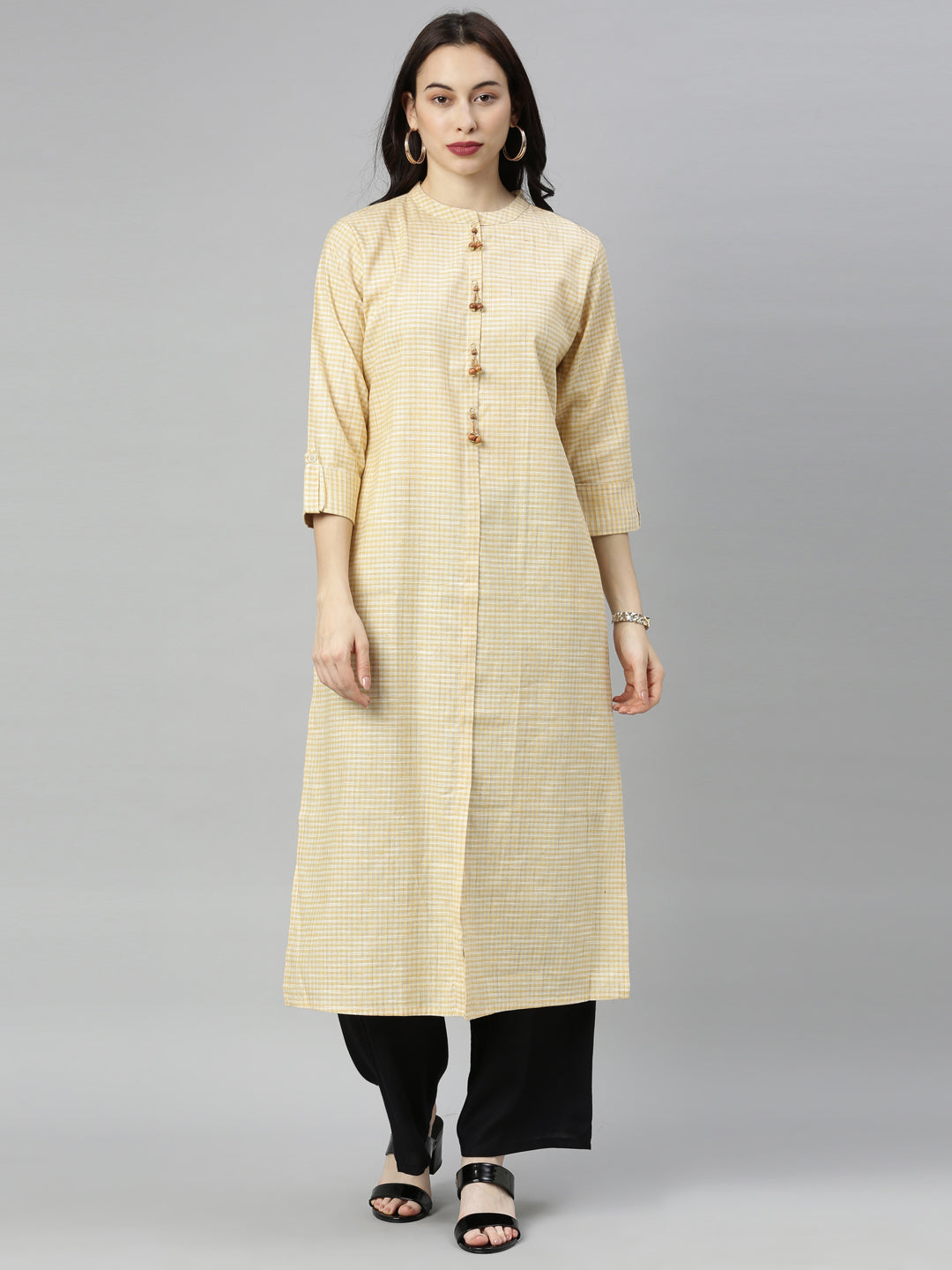 Neerus Yellow cotton checked A-line kurti - front view