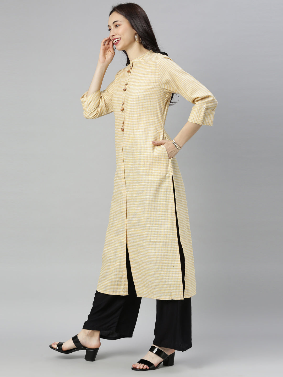 Neerus Yellow cotton checked A-line kurti - back view