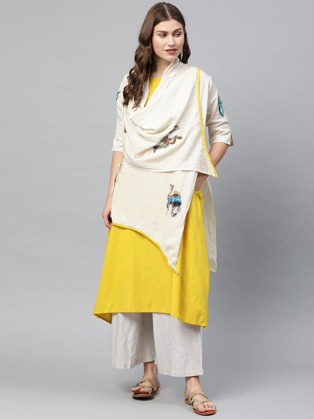 Neerus Yellow solid A-Line Kurti with shrug - front view