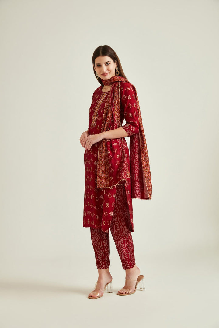 Neerus Maroon muslin mirror work kurta set - front view