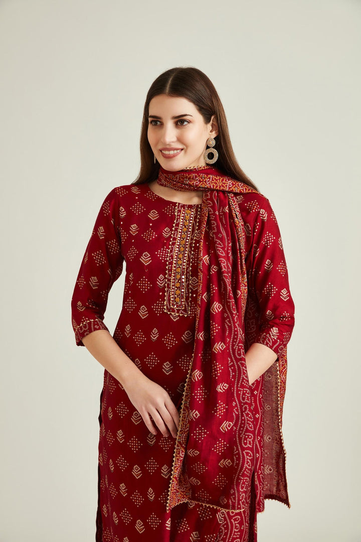 Neerus Maroon muslin mirror work kurta set - side view