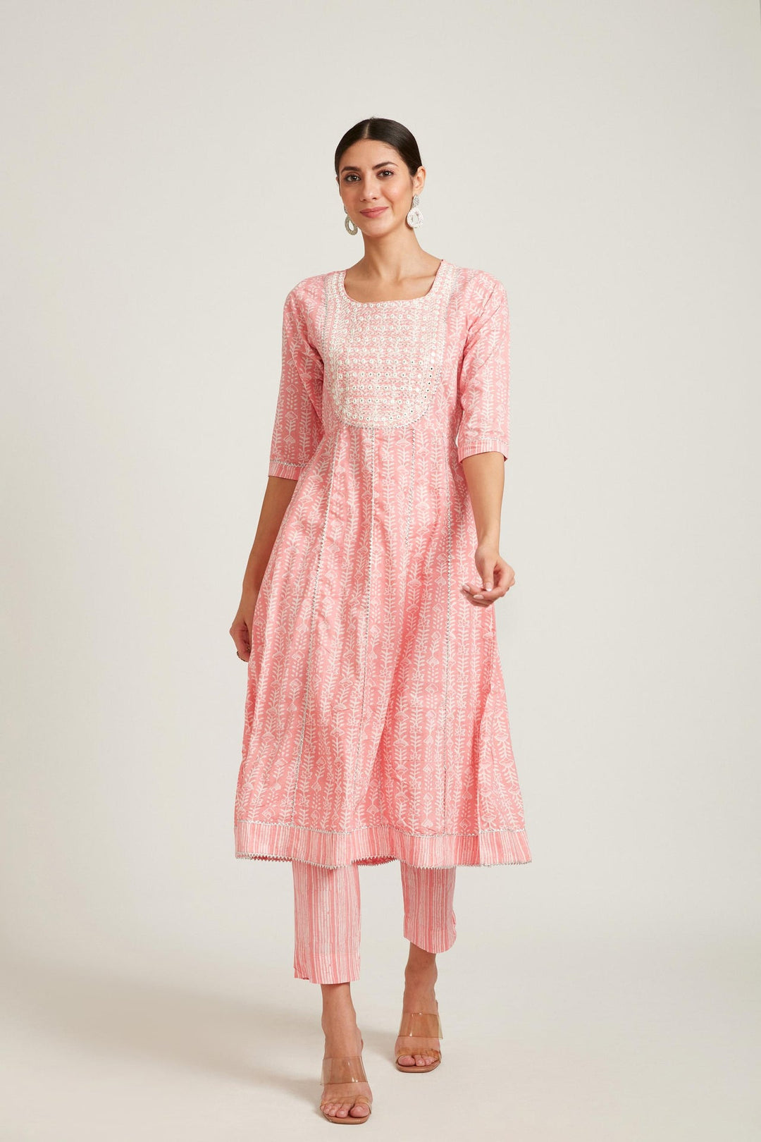 Neerus Pink cotton mirror work kurta set - side view