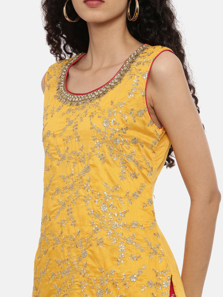 Neerus Yellow embellished kurta set with palazzo and dupatta - back view