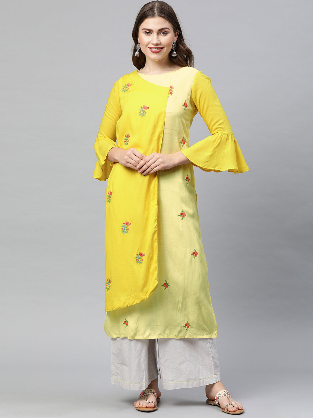 Neerus Yellow viscose rayon embroidered angrakha kurti - front view