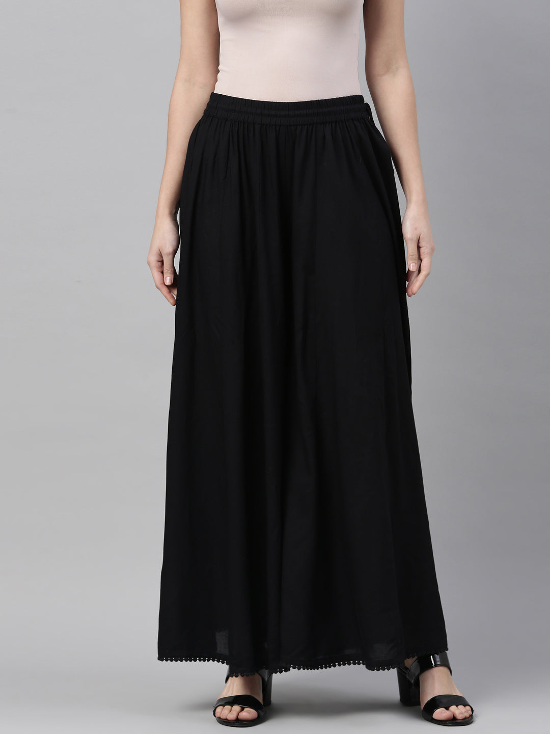 Neerus Black solid flared palazzo - back view