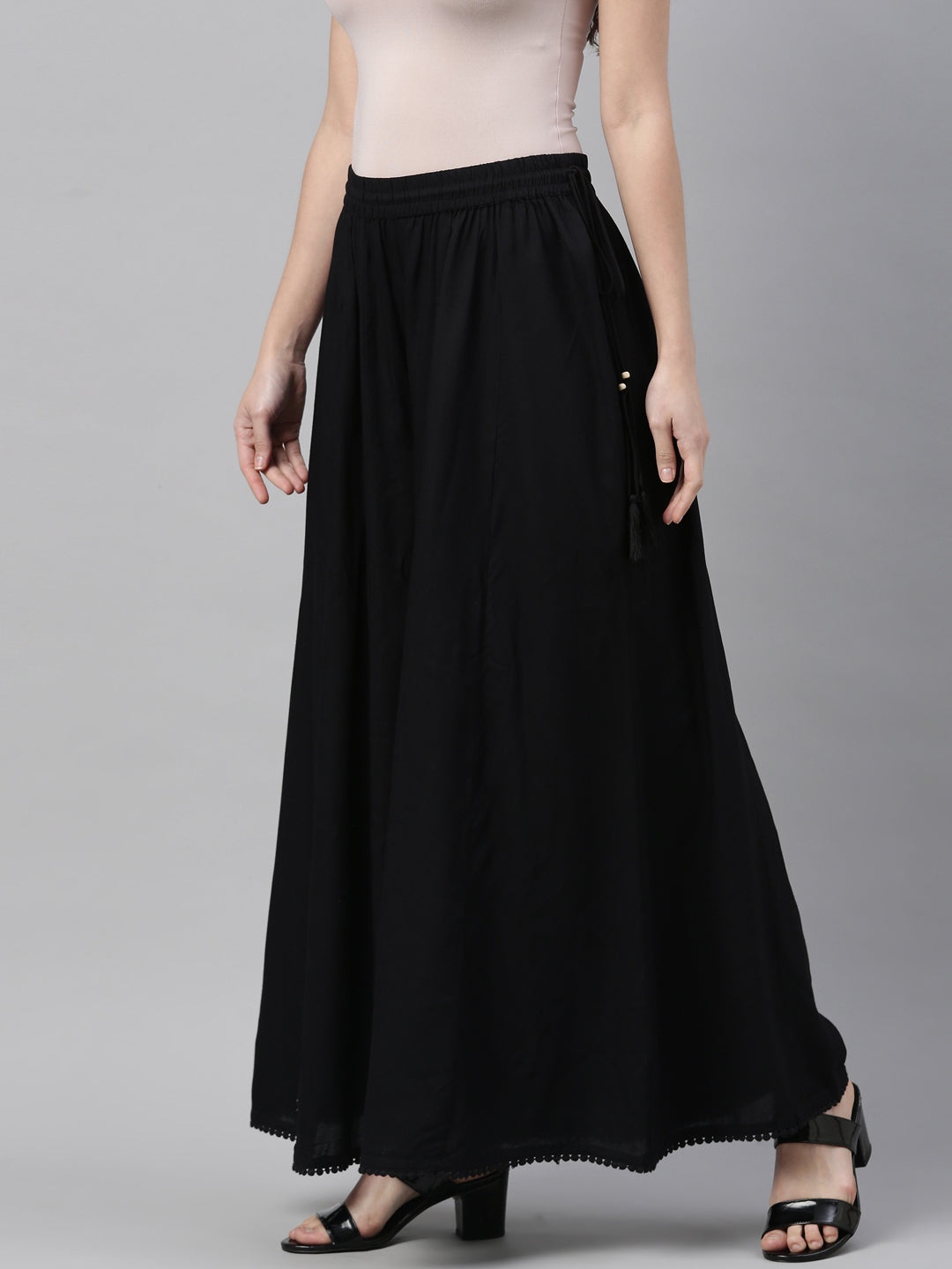 Neerus Black solid flared palazzo - side view