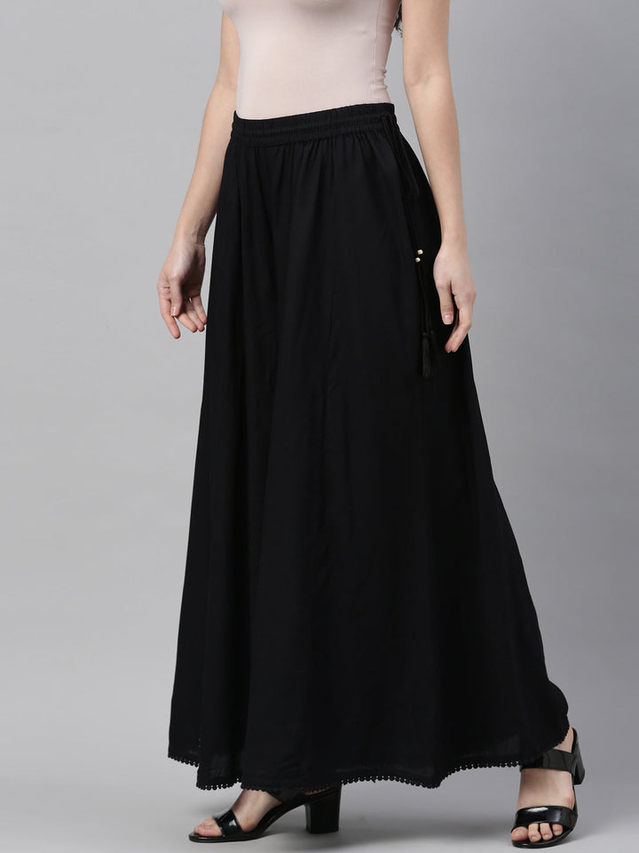 Neerus Black solid flared palazzo - side view