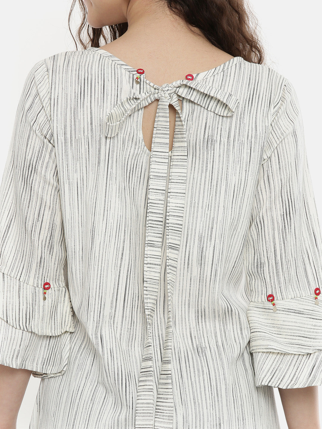 Neerus Beige cotton embroidered A-line kurta - back view