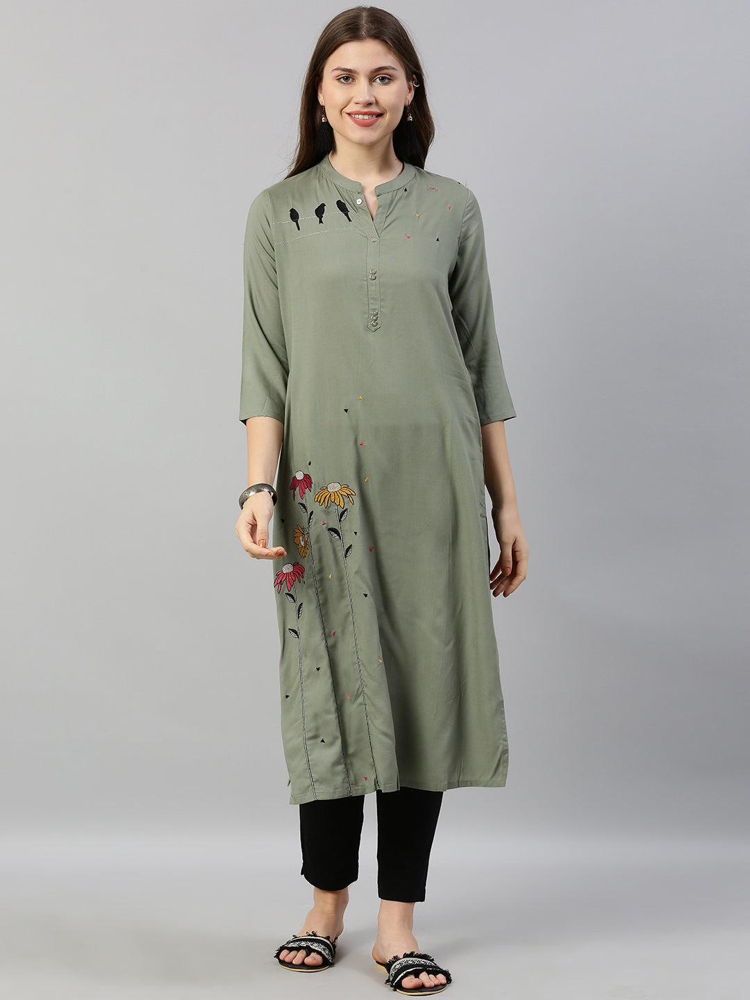Neerus Green rayon embroidered straight kurta - front view