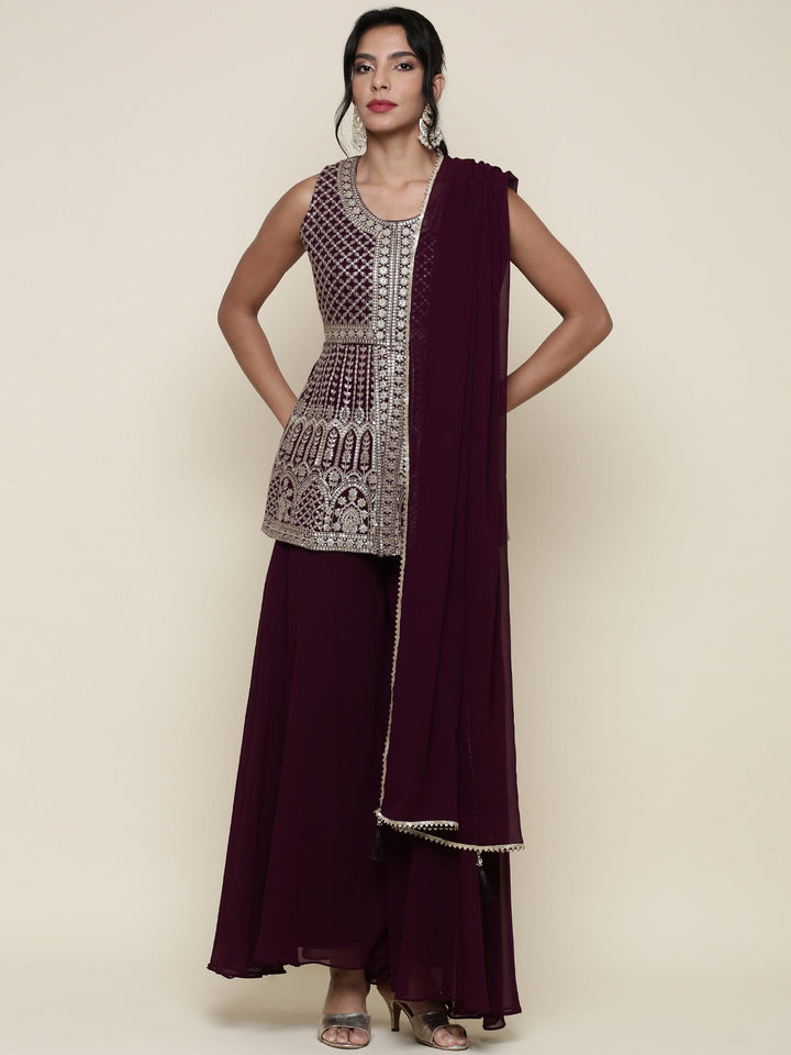 Neerus Maroon georgette embroidered suit set - front view