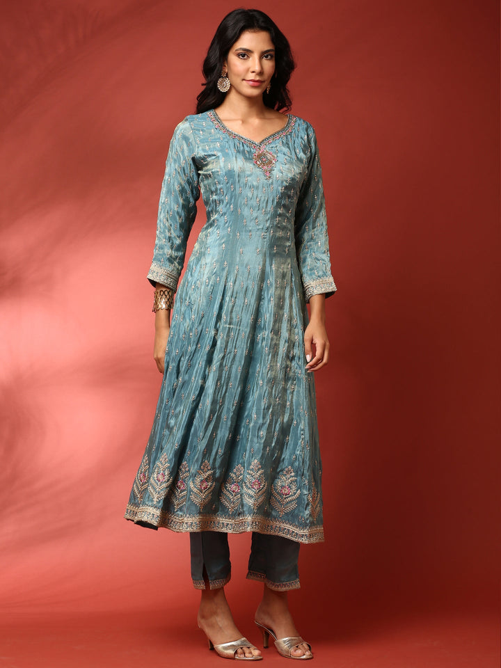 Neerus Green tissue hand embroidered anarkali suit set - side view