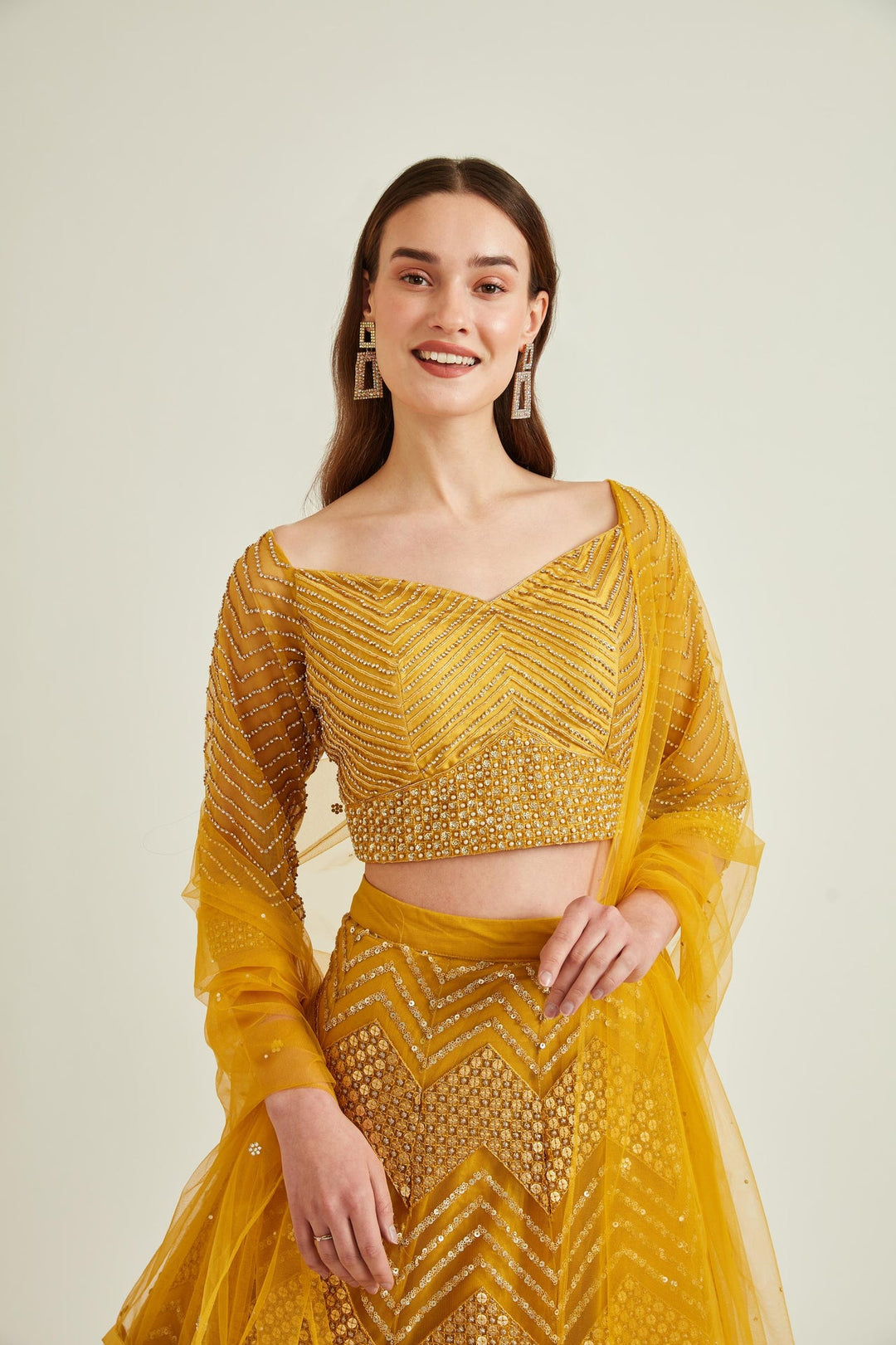 Neerus Yellow net embellished lehenga set - side view