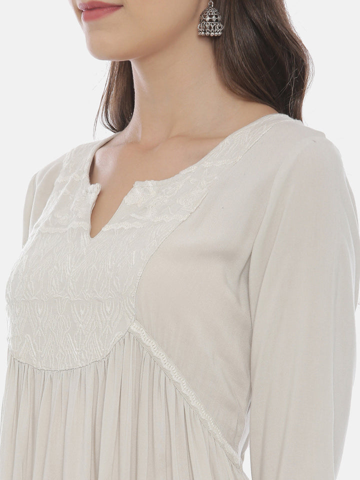 Neerus Beige rayon solid kurti - back view