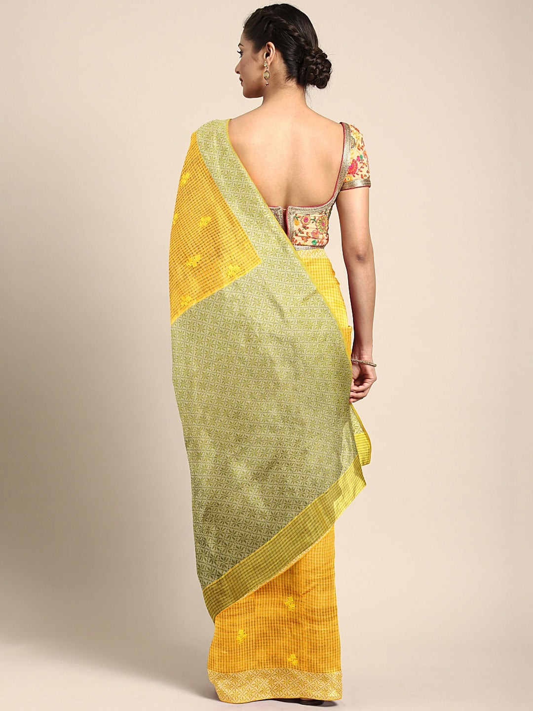 Neerus Yellow cotton woven saree - back view