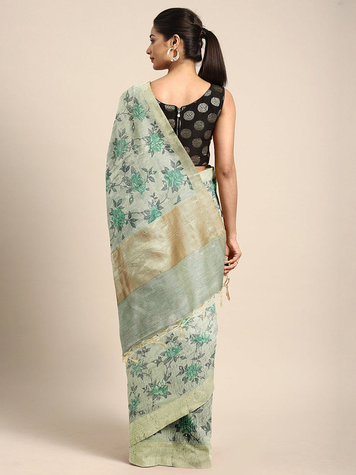 Neerus Green polyester woven saree - back view