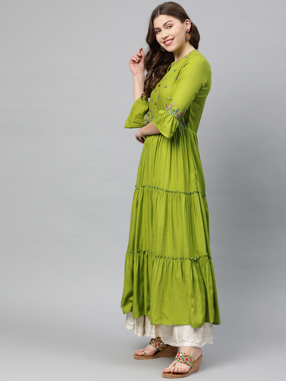 Neerus Green rayon woven A-line tiered kurta - side view