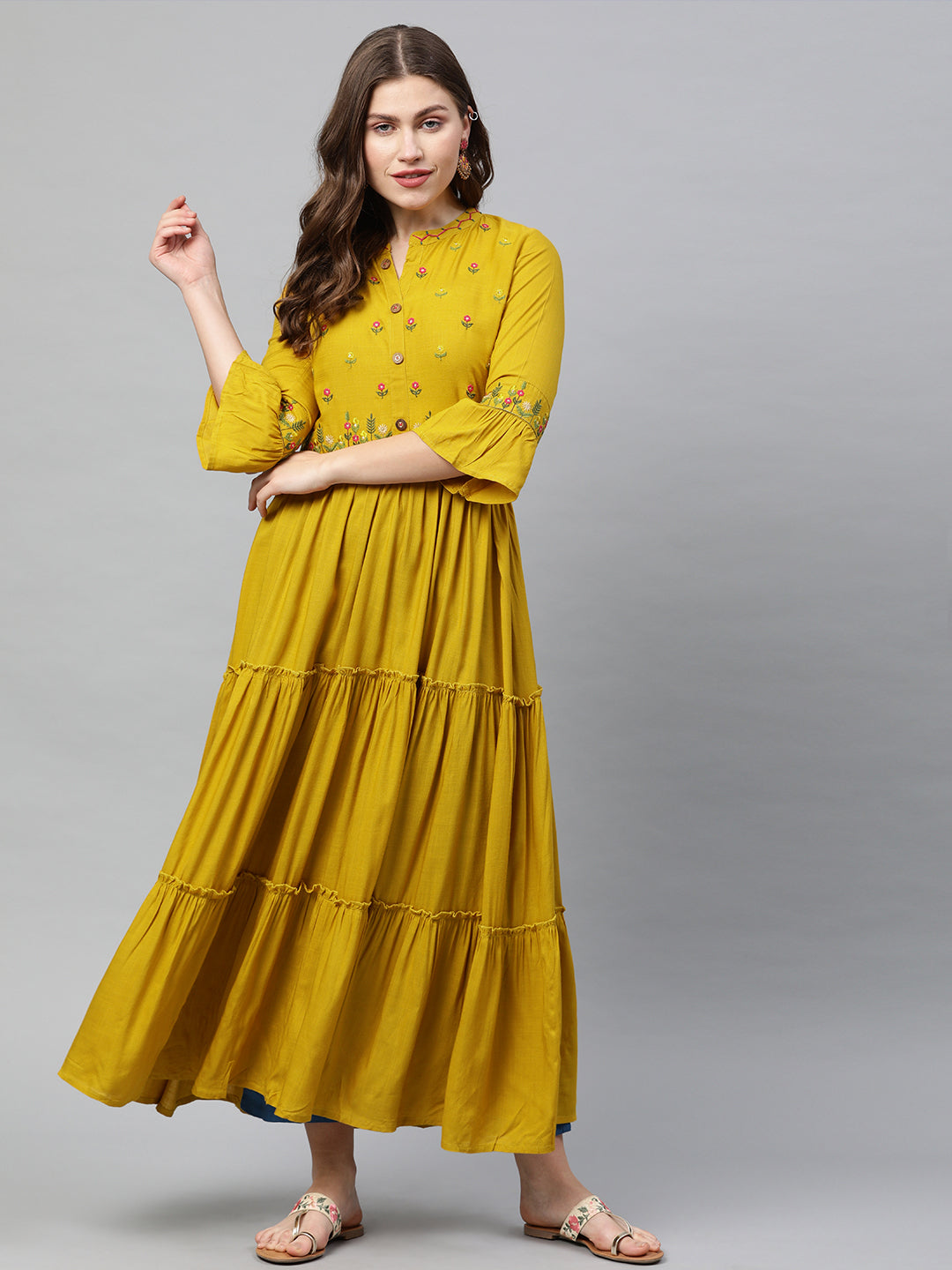 Neerus Yellow rayon embroidered A-line tiered kurta - front view