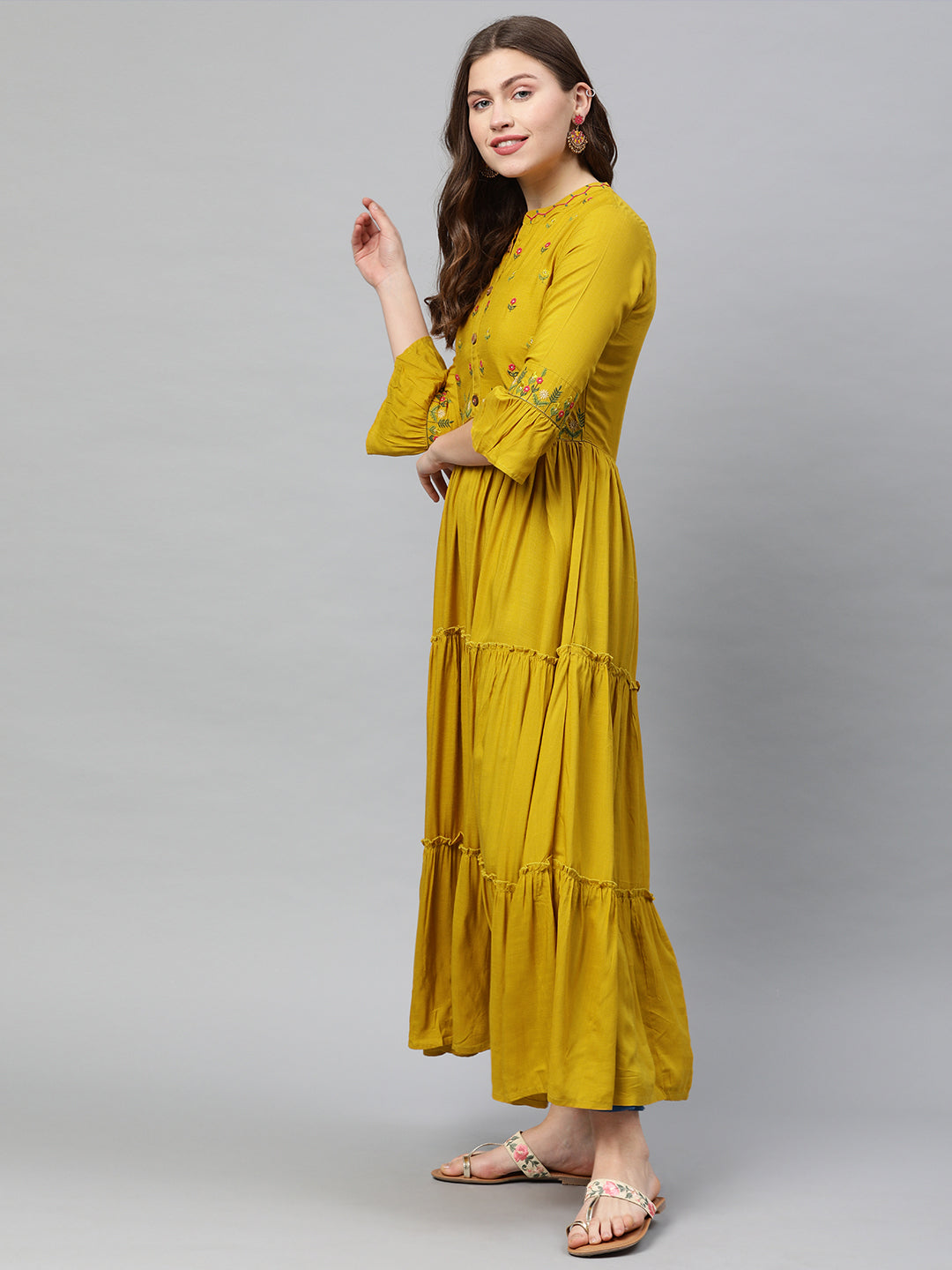 Neerus Yellow rayon embroidered A-line tiered kurta - side view