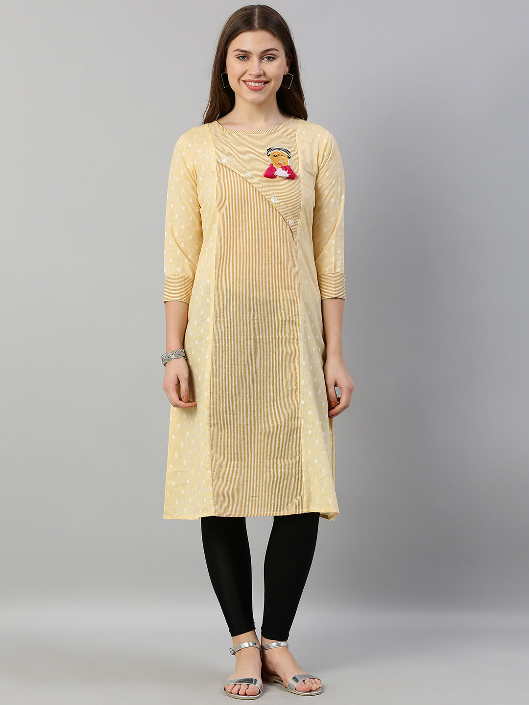 Neerus Yellow cotton embroidered A-Line kurta - front view