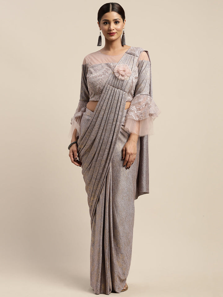 Neerus Pink viscose rayon drape saree with stitched blouse - front view