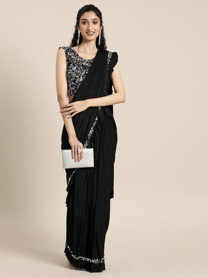 Neerus Black lycra draped saree - front view