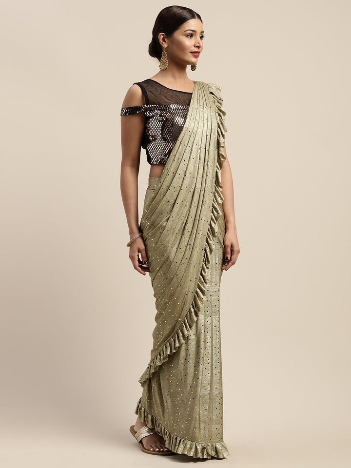 Neerus Green viscose rayon drape saree with stitched blouse - back view