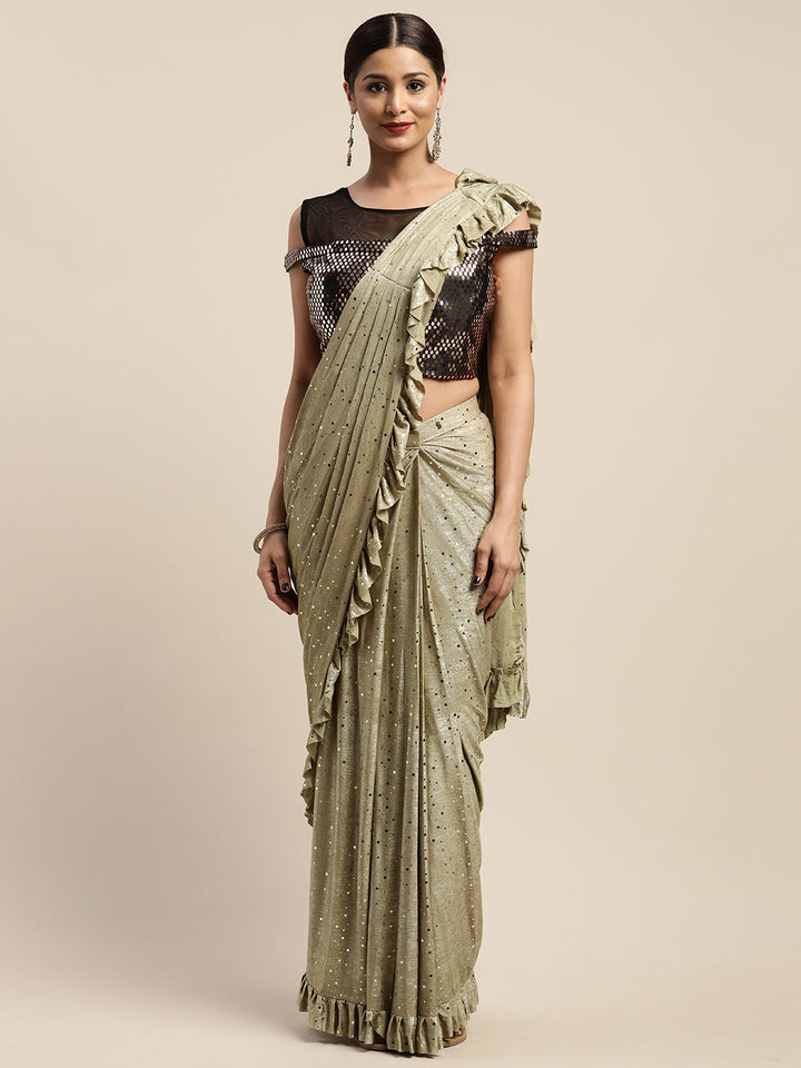 Neerus Green viscose rayon drape saree with stitched blouse - front view