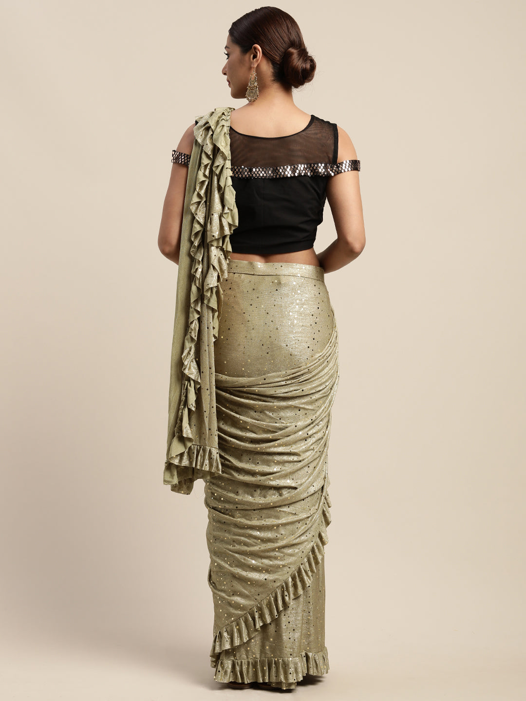 Neerus Green viscose rayon drape saree with stitched blouse - side view