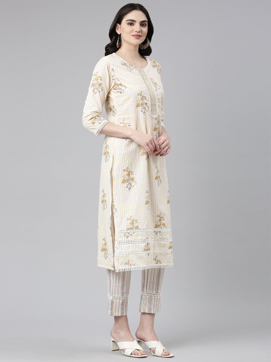 Neerus Yellow cotton printed kurta set with trouser and dupatta - back view