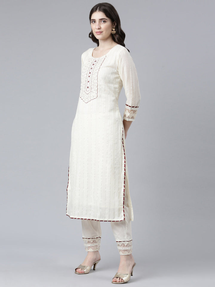 Neerus White cotton solid kurta set with trouser and dupatta - back view