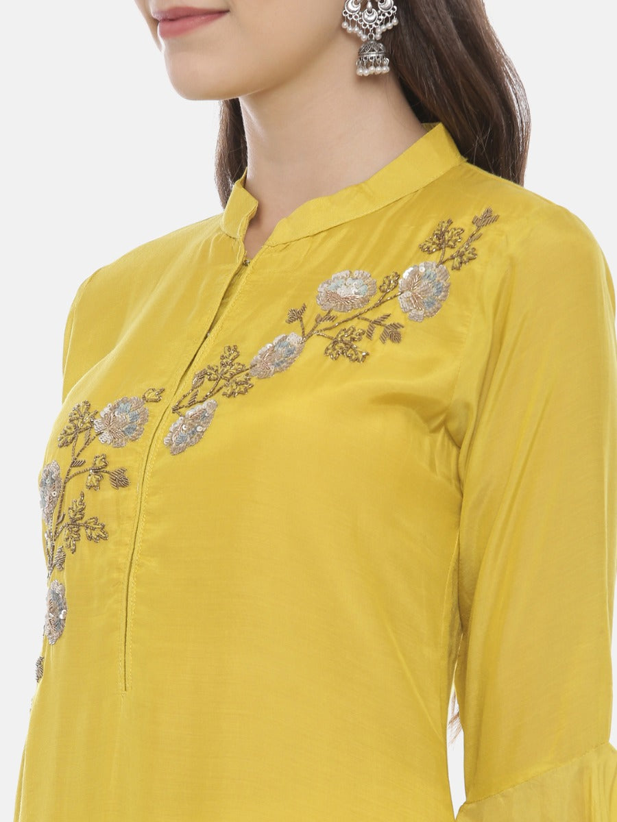 Neerus Yellow muslin embellished straight kurta - back view