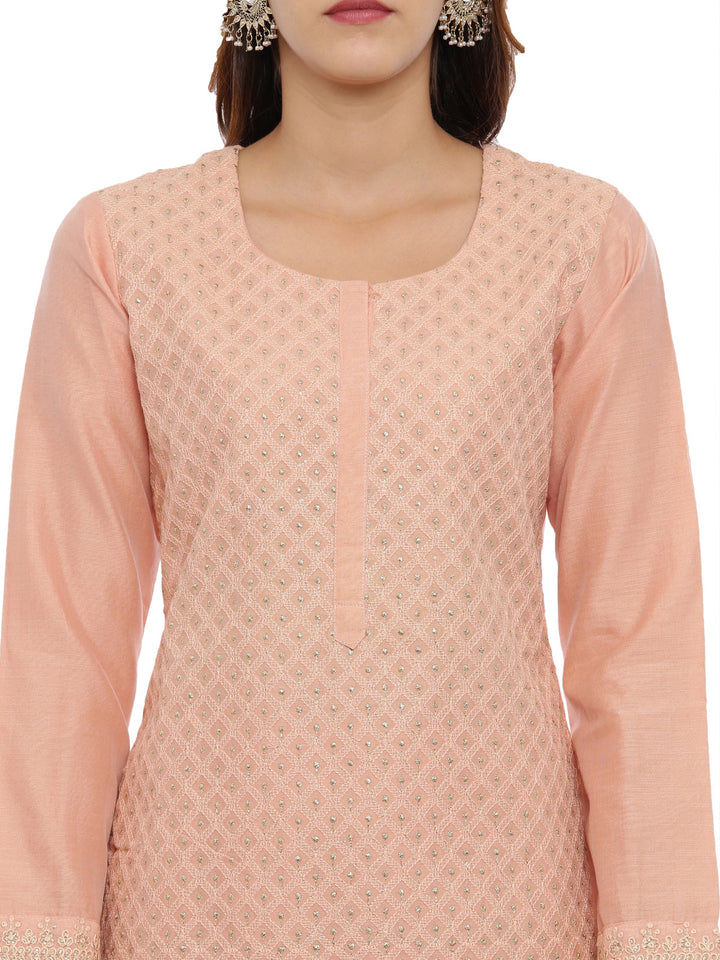 Neerus Orange embroidered kurta set with palazzo and dupatta - back view
