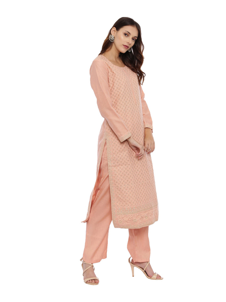 Neerus Orange embroidered kurta set with palazzo and dupatta - side view