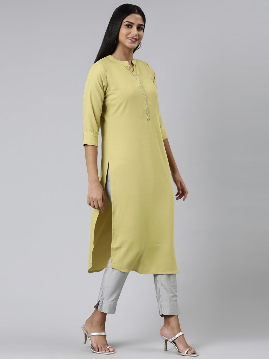 Neerus Green viscose rayon solid straight kurti - back view