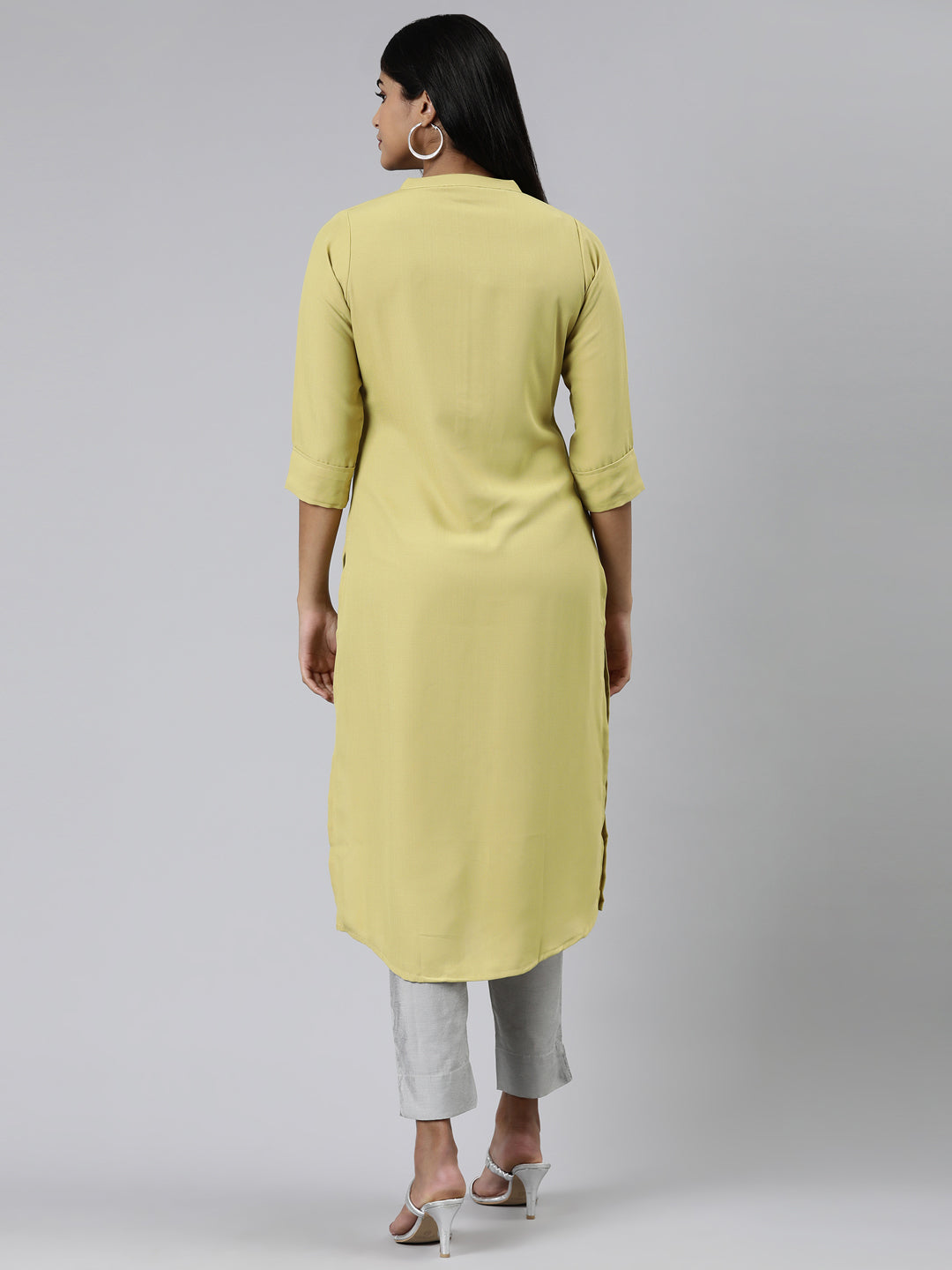 Neerus Green viscose rayon solid straight kurti - side view
