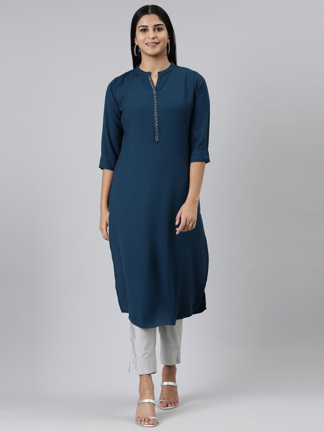 Neerus Green viscose rayon solid straight kurti - front view