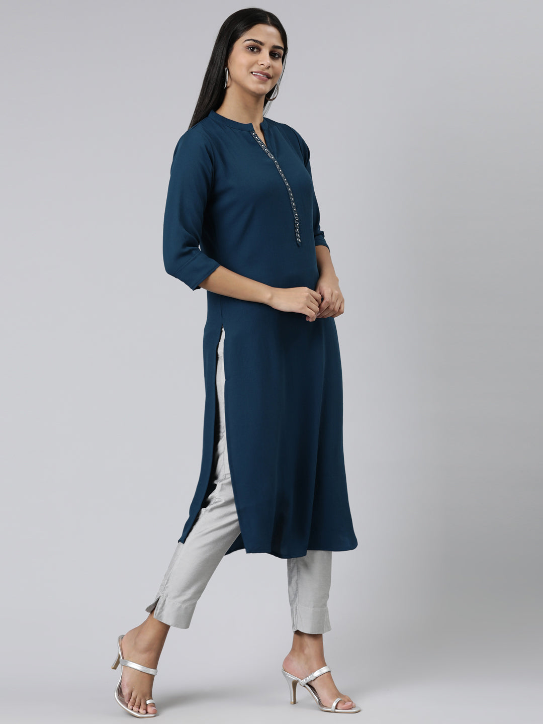 Neerus Green viscose rayon solid straight kurti - back view