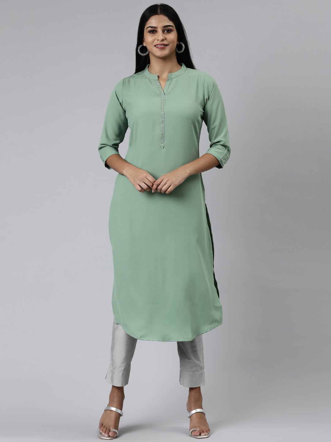 Neerus Green viscose rayon embellished kurti - front view
