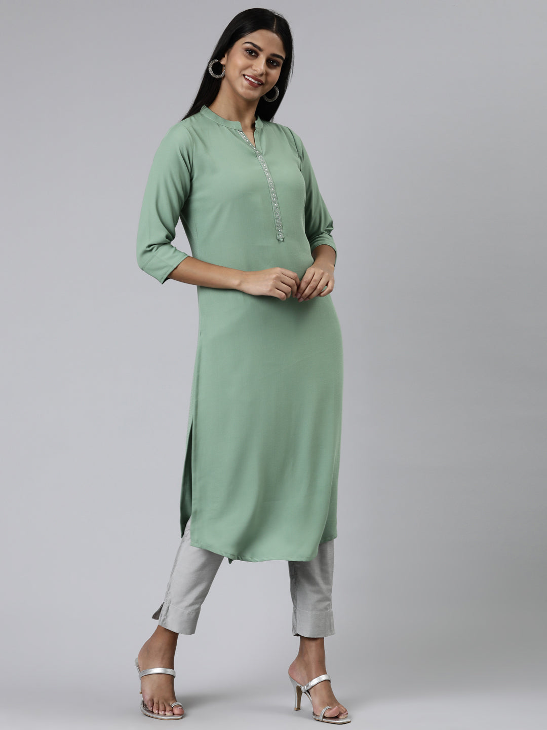 Neerus Green viscose rayon embellished kurti - back view