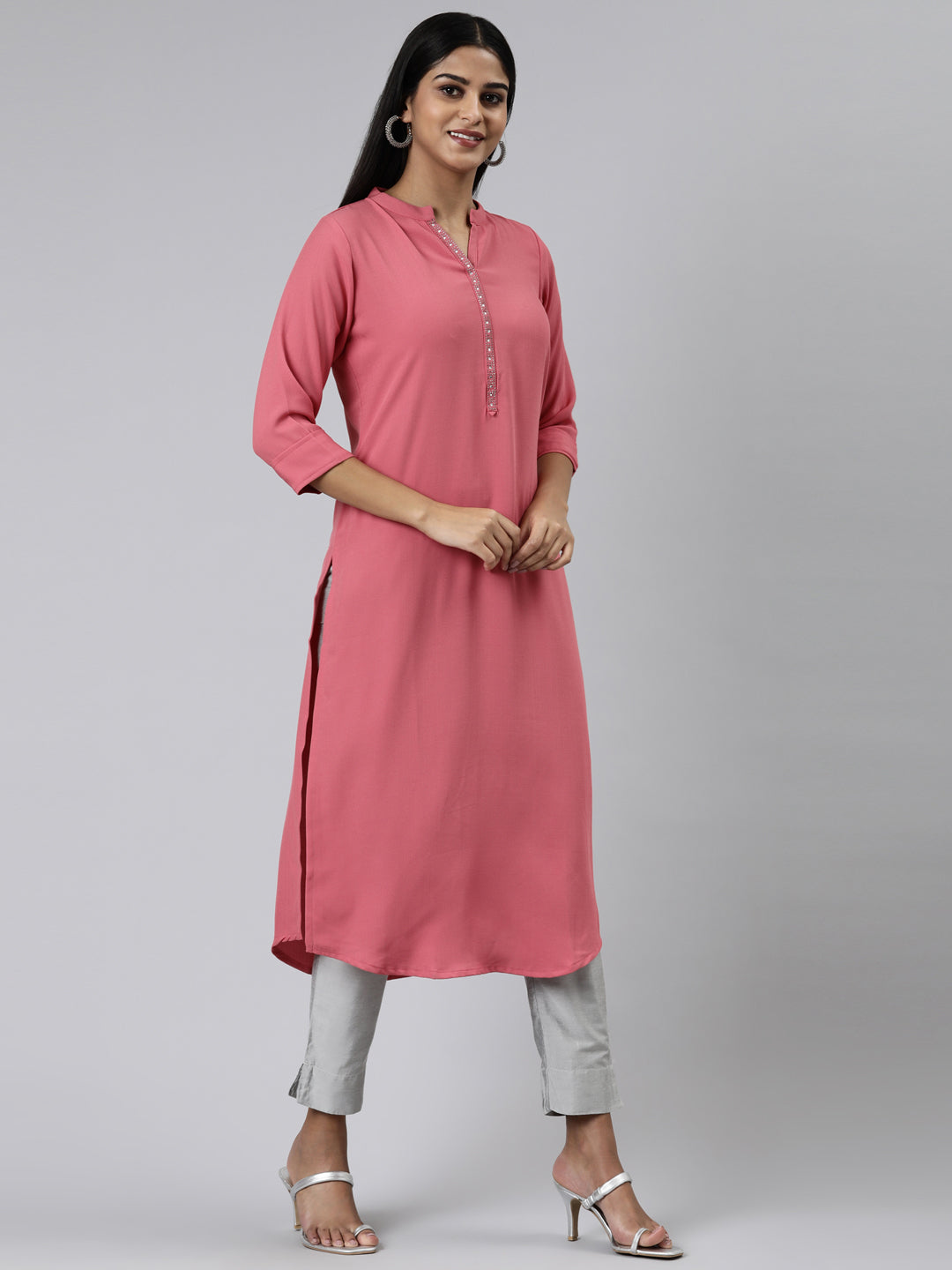 Neerus Pink viscose rayon solid straight kurti - back view
