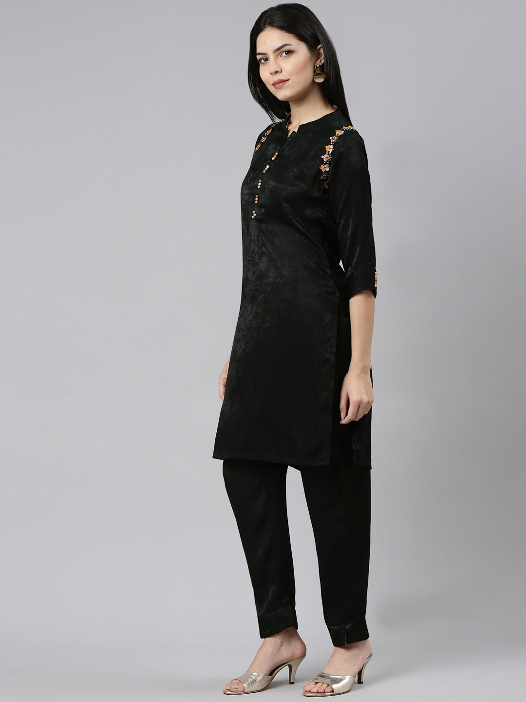 Neerus Green solid straight kurta set with trouser - back view