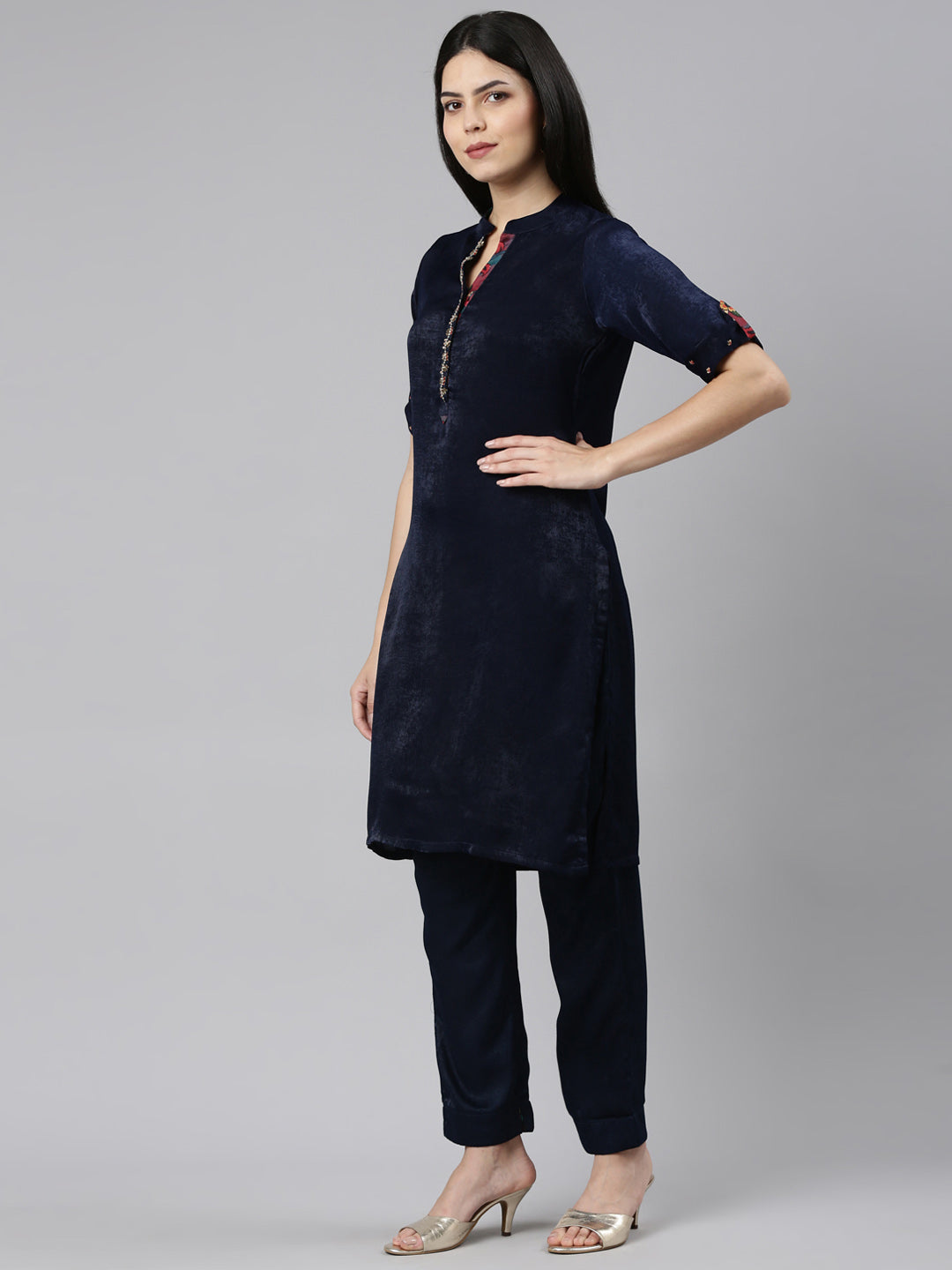 Neerus Blue solid straight kurta set with trousers - back view