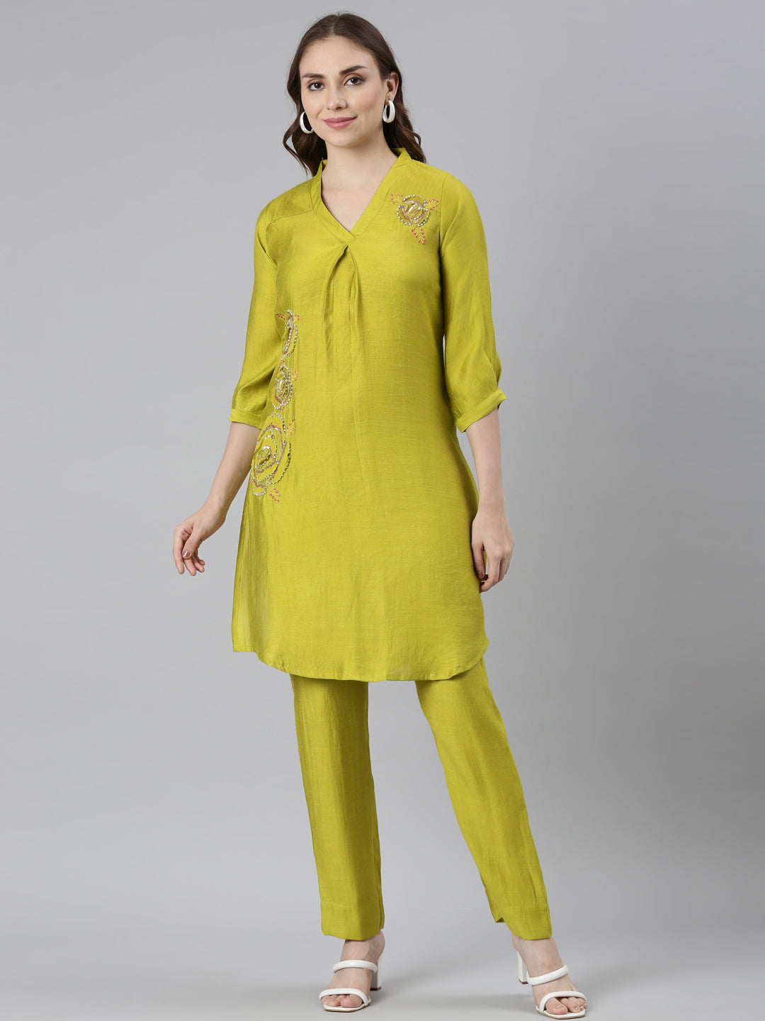 Neerus Green solid curved kurta set with trouser - front view