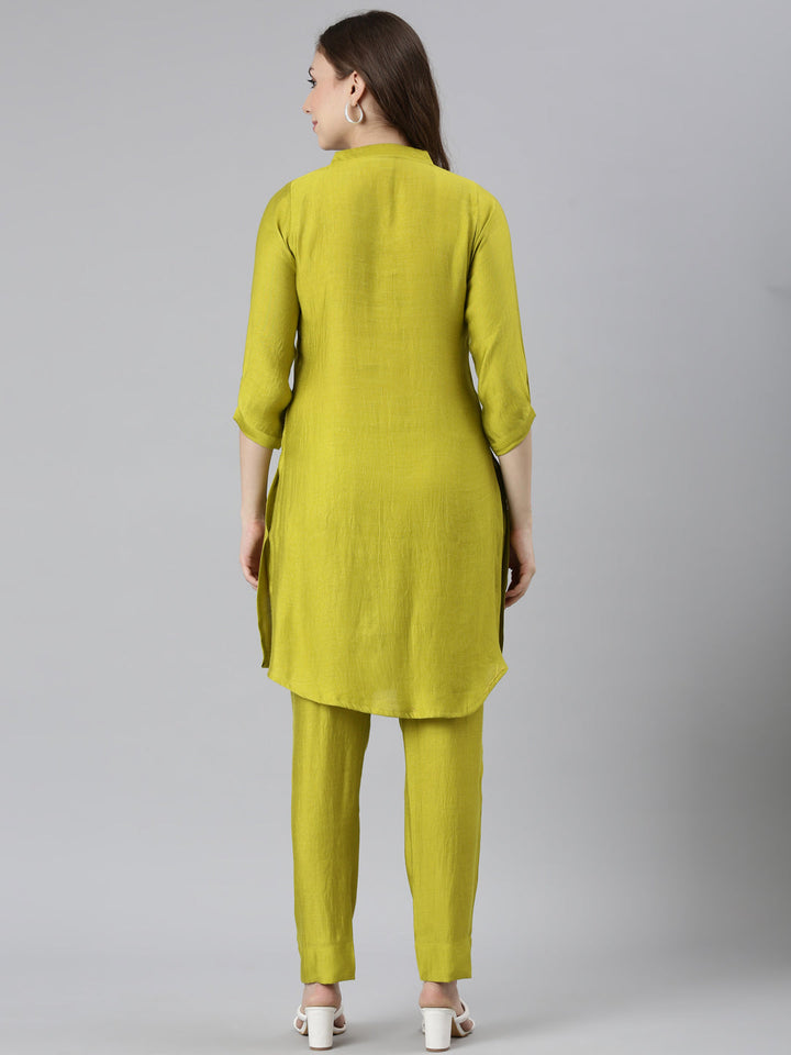 Neerus Green solid curved kurta set with trouser - side view