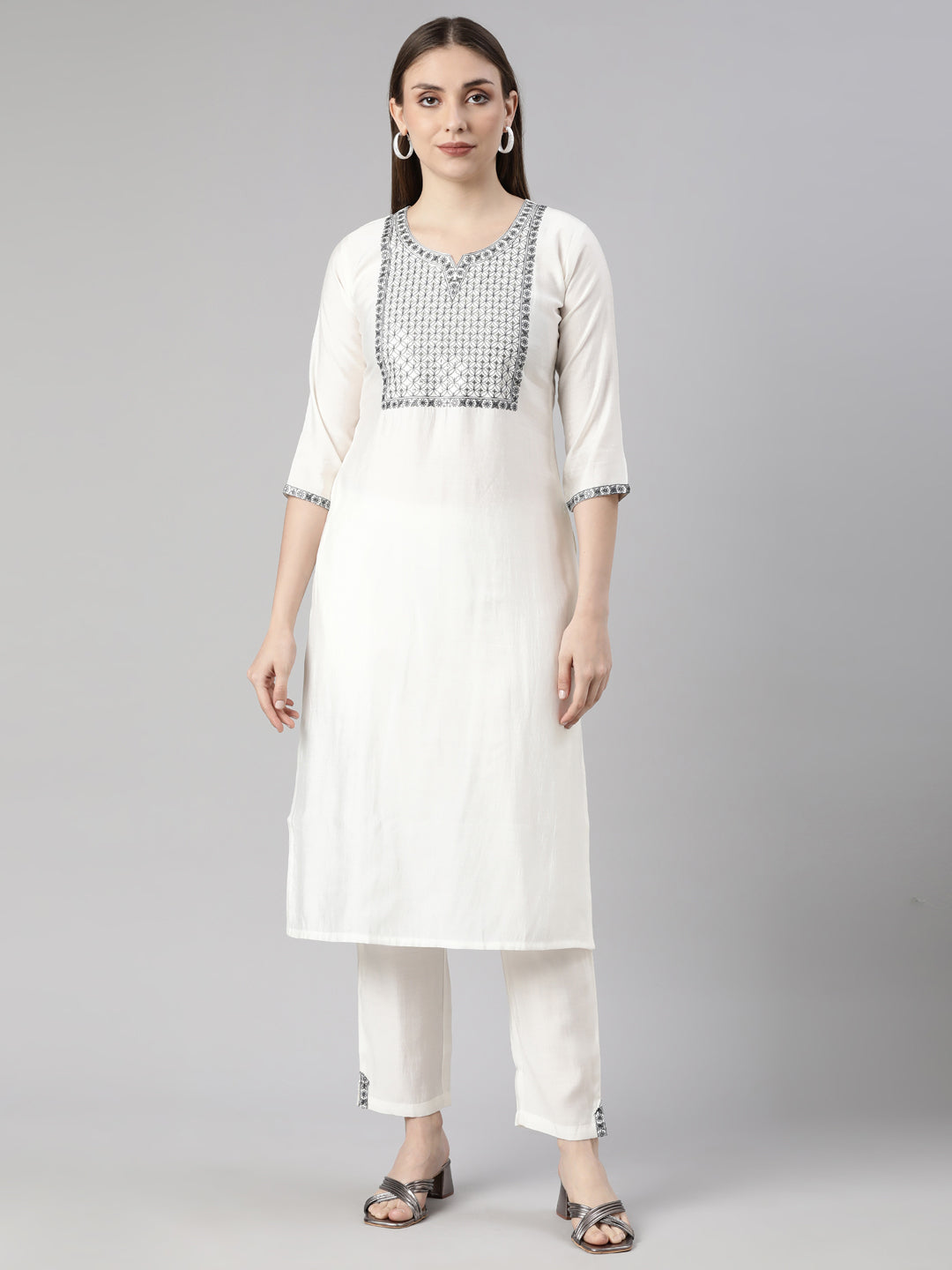 Neerus White solid straight kurta set with trouser - front view