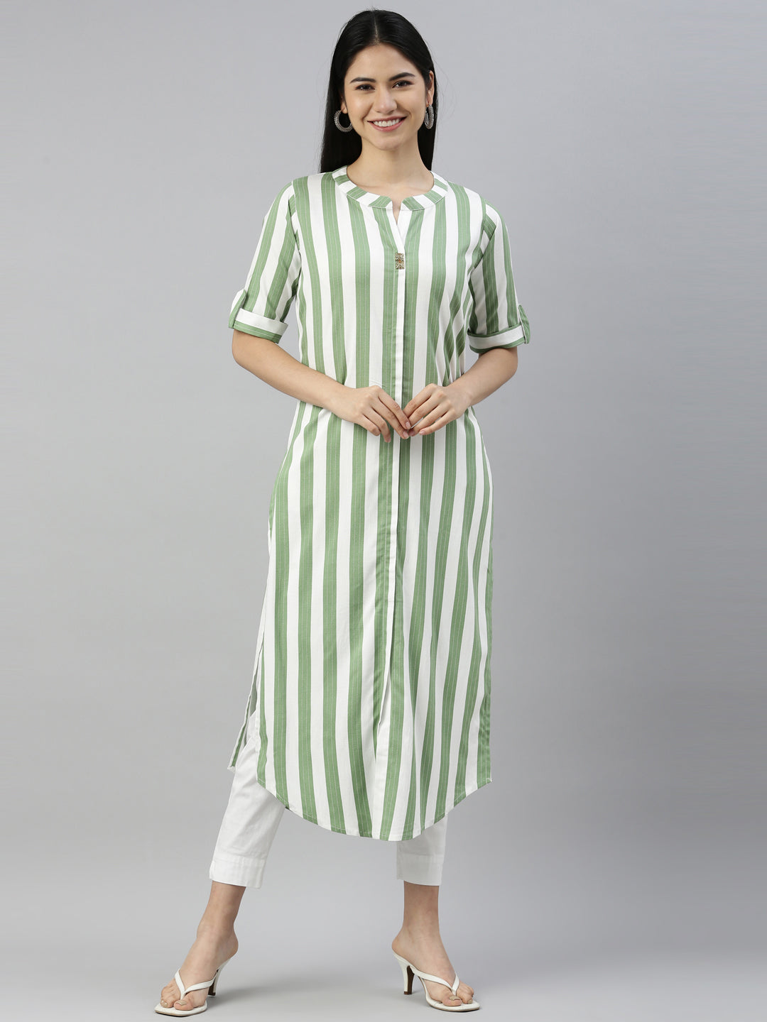 Neerus Green viscose rayon solid kurti - front view