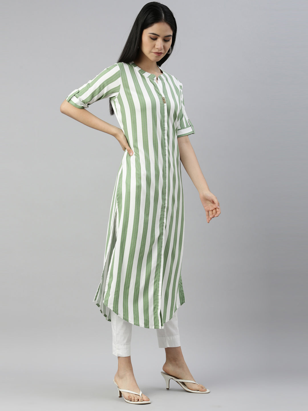 Neerus Green viscose rayon solid kurti - side view