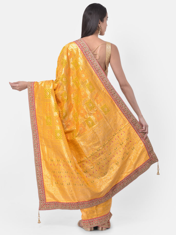 Neerus Yellow Banarasi woven saree - back view