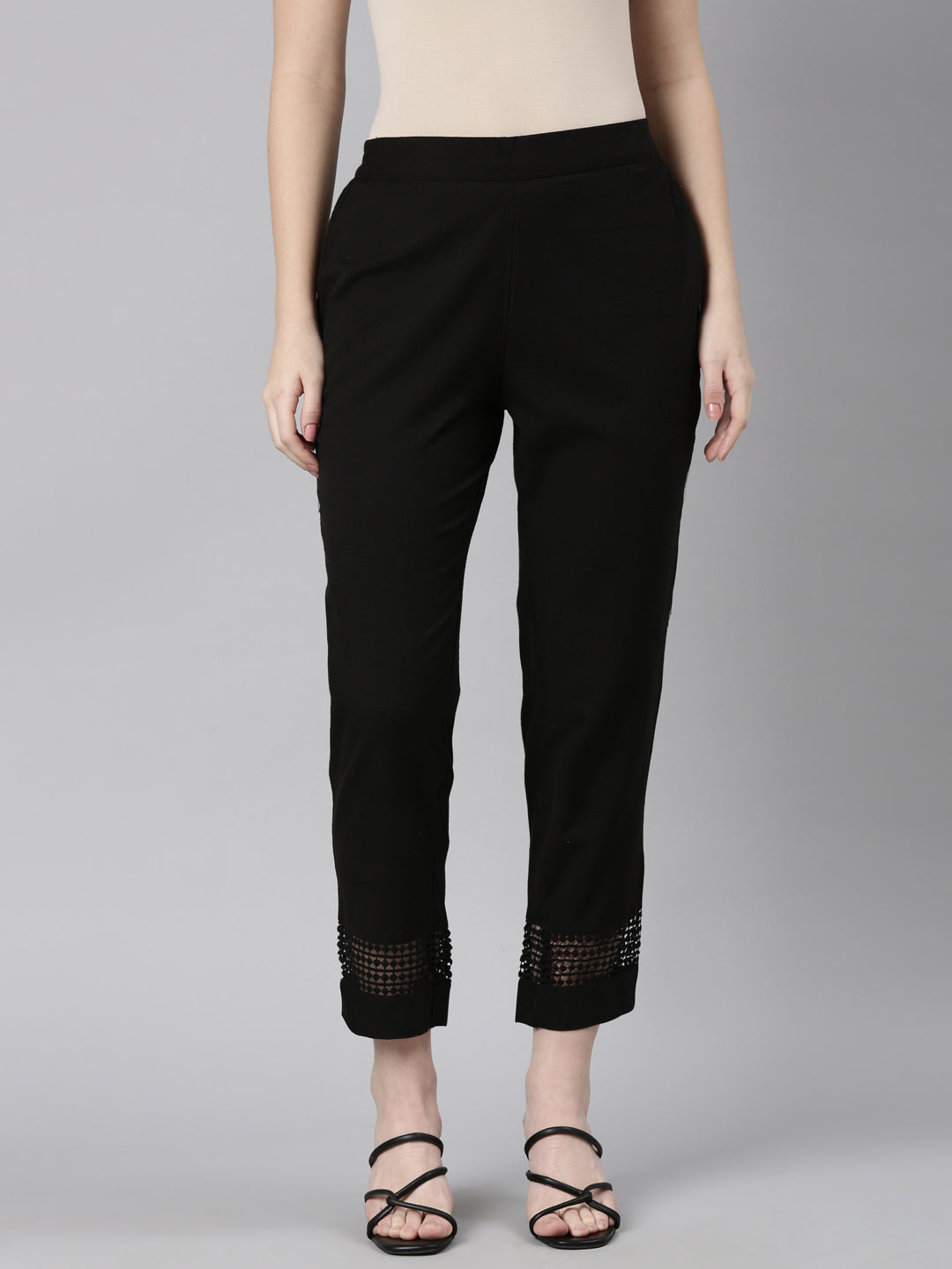 Neerus Black solid straight pant - front view